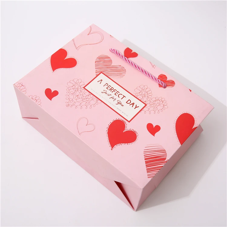 Gonhua Wholesale Luxury Gold Foil Pink Kraft Packing Paper Bag With Ribbons Custom Logo Gift Printed Shopping Bag