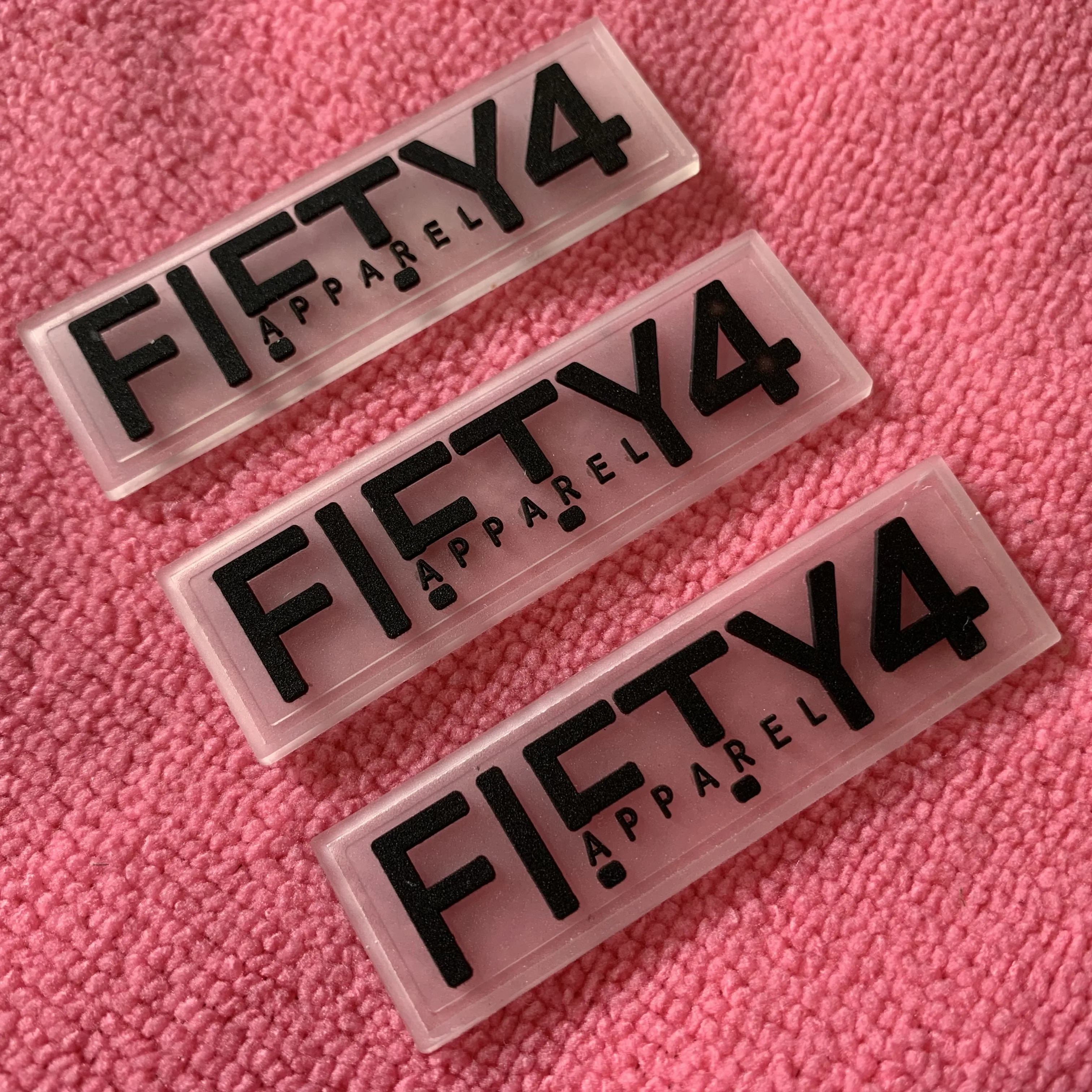 Chinese factory stitching on 3D raised logo transparent rubber label,high quality apparel clear PVC label