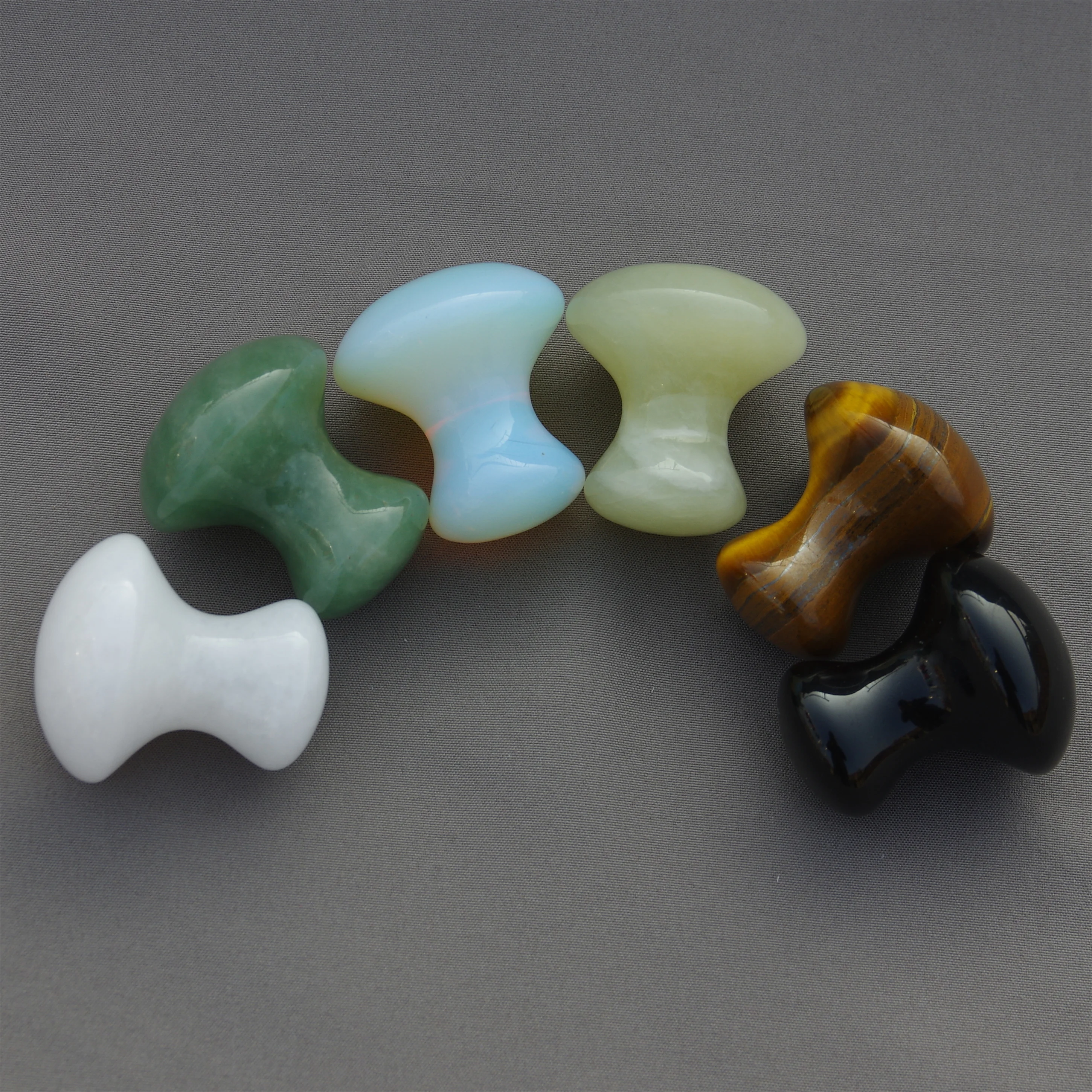 Manufacturers sell natural jade mushroom head powder crystal white crystal can massage health care scraping board