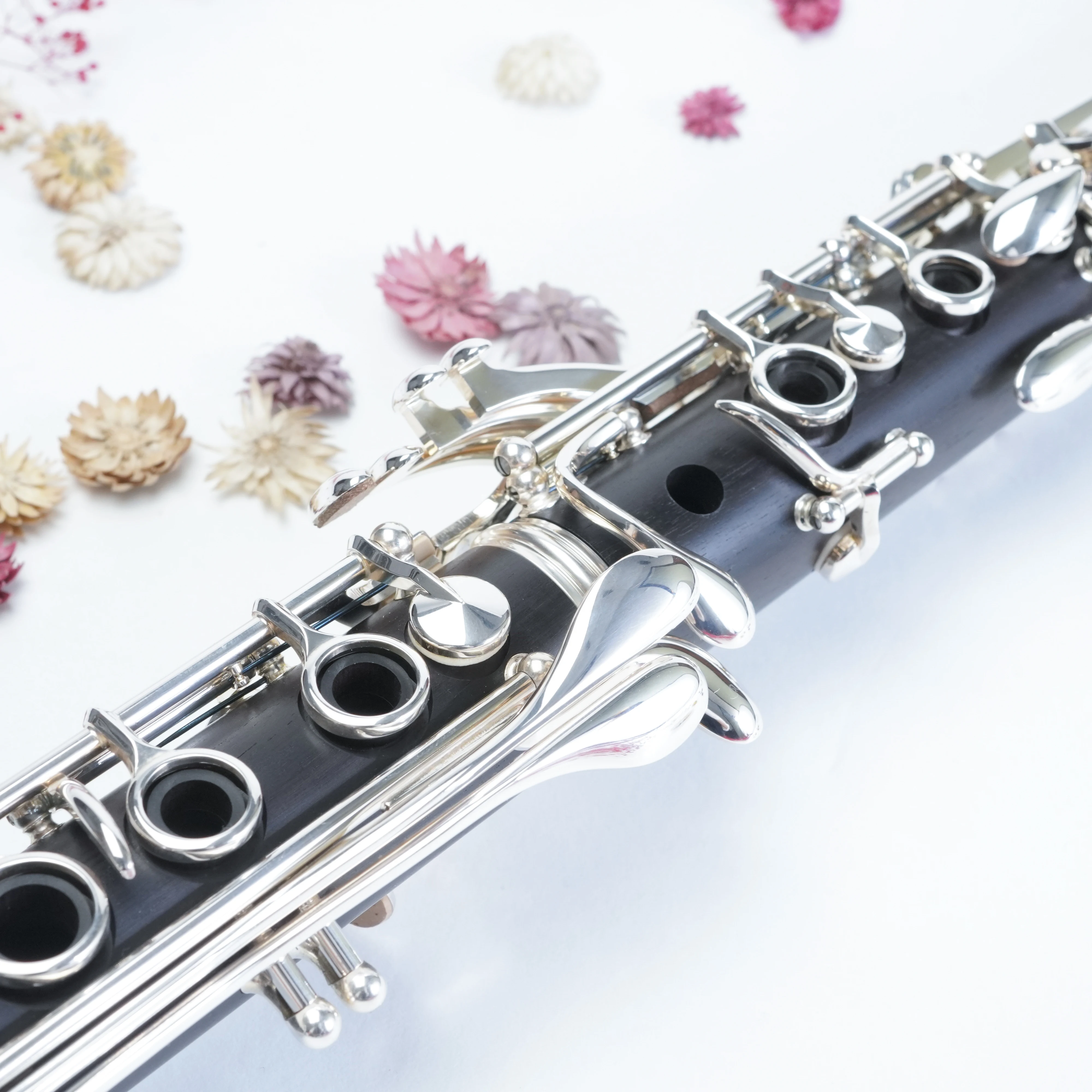 Wooden bass woodwind instruments by leading technology and craftsmanship