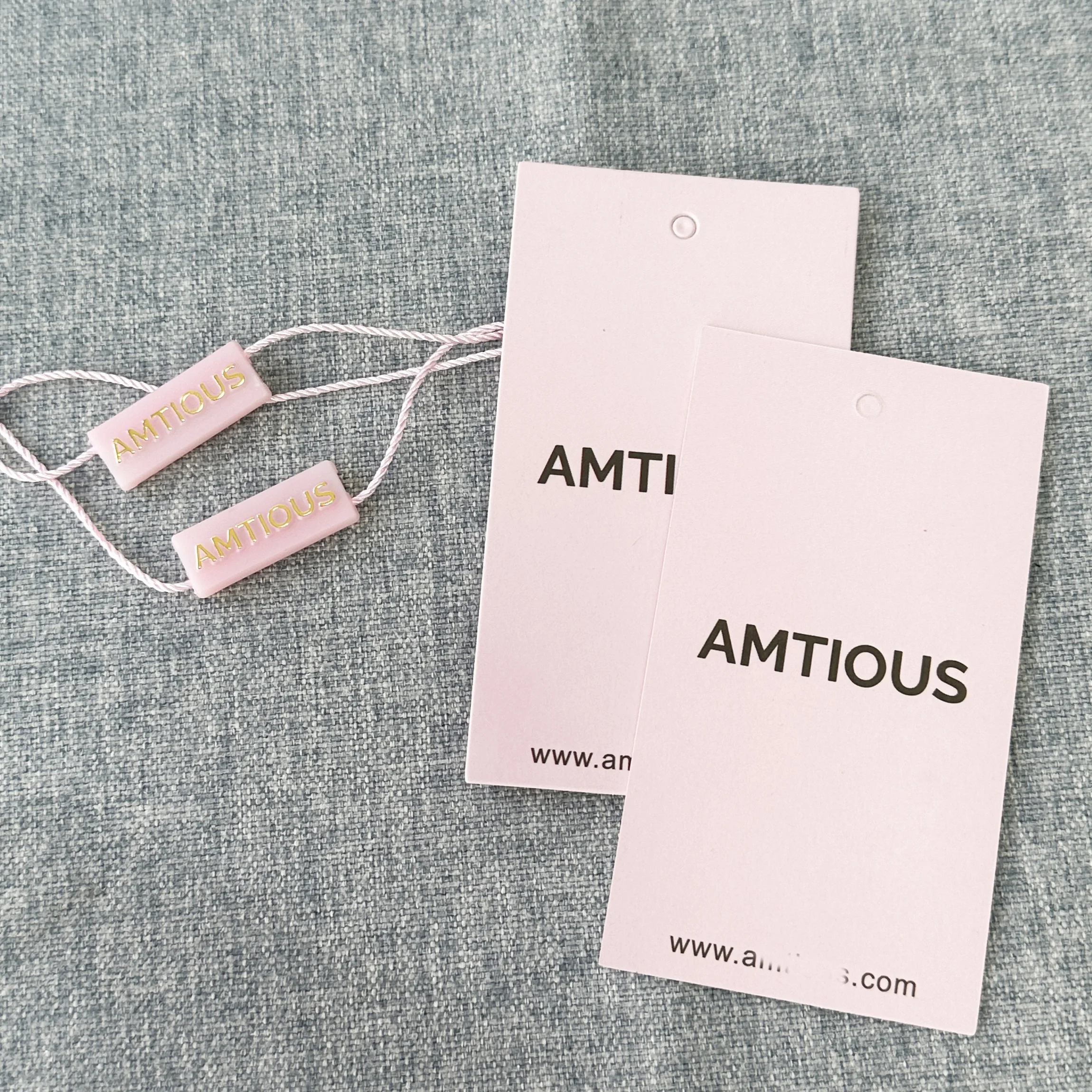 High-end custom garment swing tag plastic bag and cardboard hang tags for clothing own logo