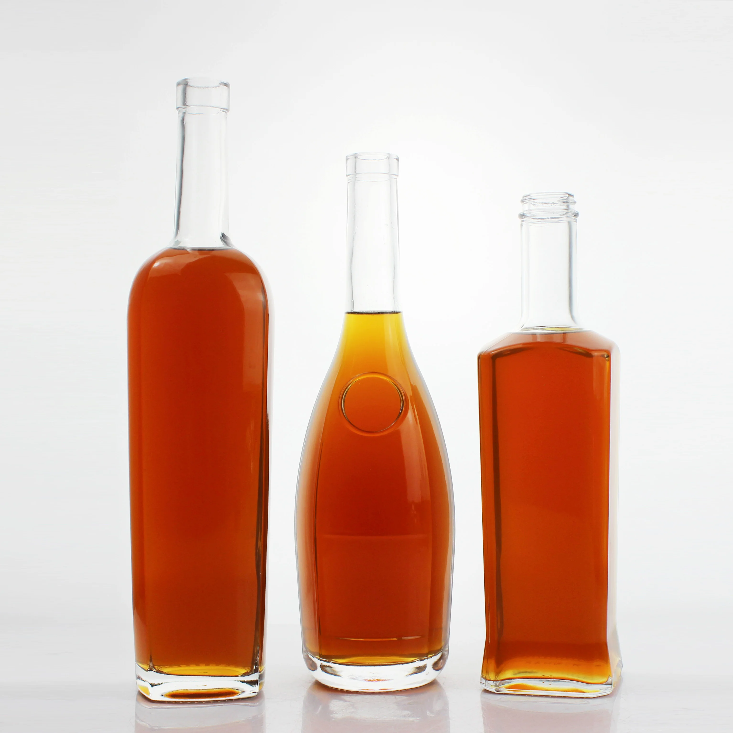 wholesale 500ml 700ml 750ml 1 liter round bottles glass empty gin vodka whiskey glass liquor bottle gin glass bottle with lid