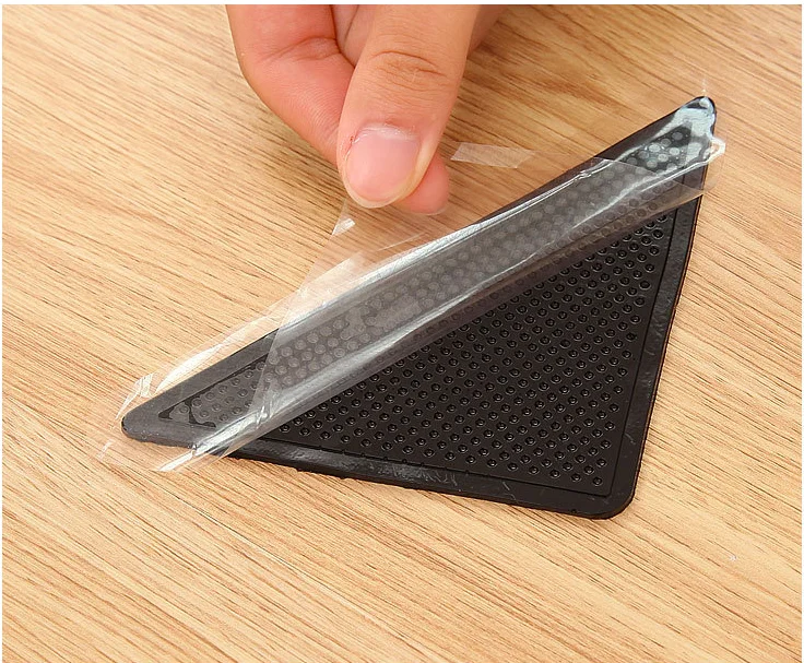Christmas gift Wholesale Reusable Waterproof Anti Slip Self Adhesive Triangle rug gripper pad For Carpet corner Grippers