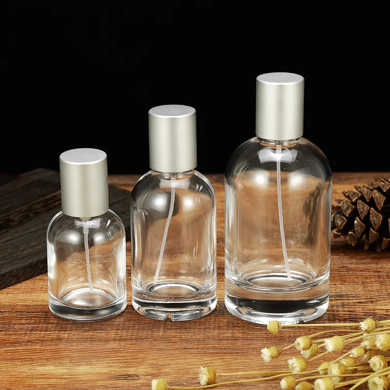 2023Custom Luxury Silver/black/gold Cap Perfume Spray Bottles 30ml 50ml 100ml Round Cylinder Empty Perfume Glass Bottle