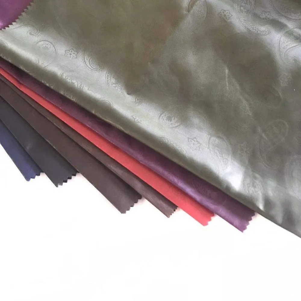 190T 210T Embossed Polyester Taffeta Lining Fabric 53GSM Dobby Design For Garment