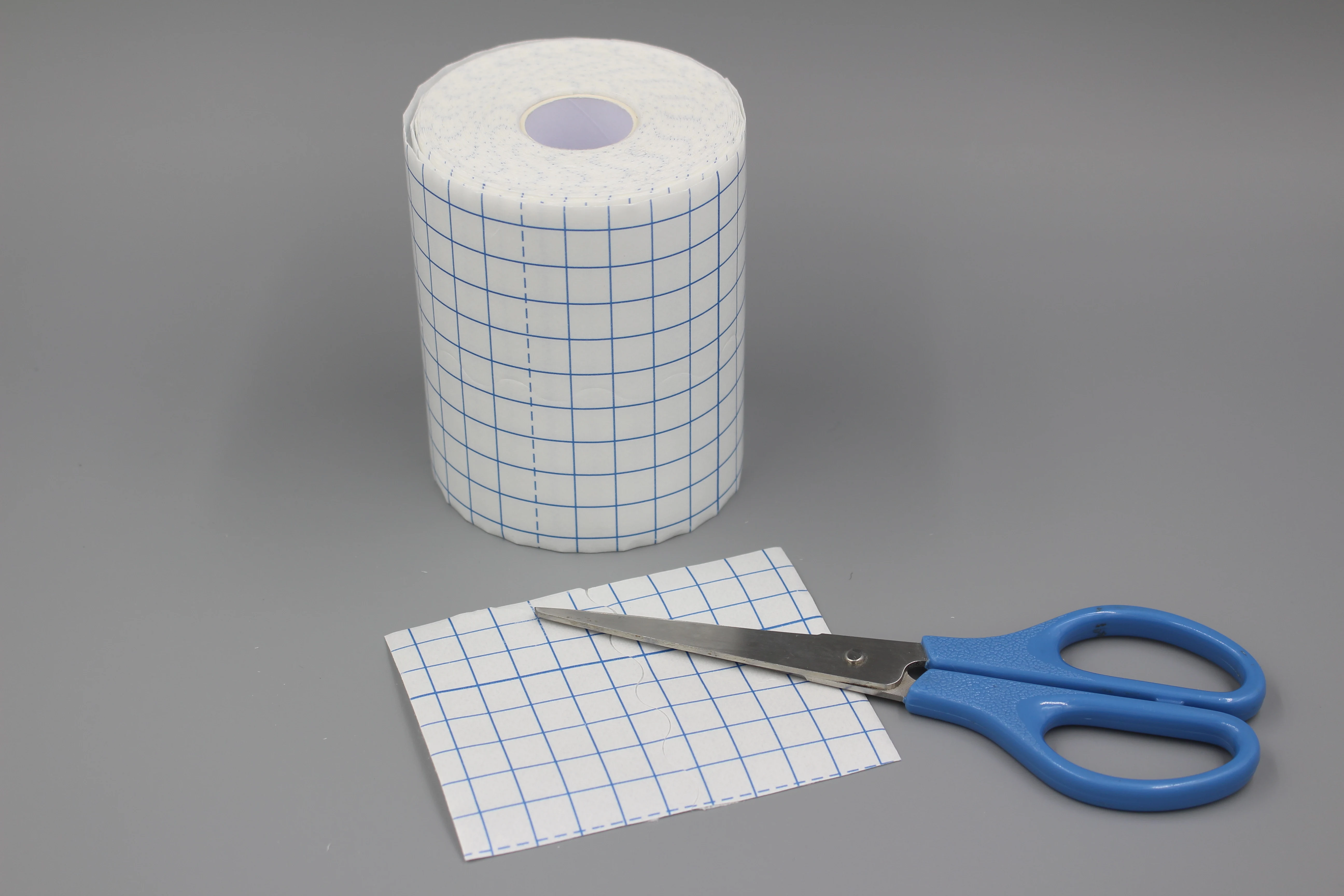 Bulk sale Non-Woven Cover Stretch Tape  Bandages Breathable adhesive Wrap Bandages fixing tape jumbo Roll factory