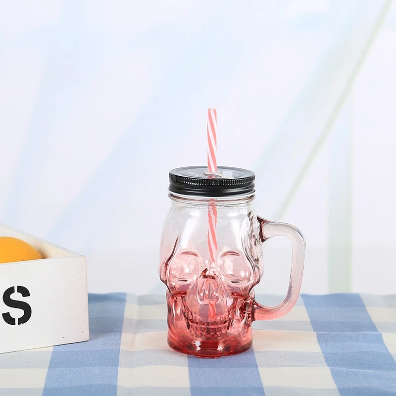 Custom Color Food Grade Skull Shape Wide Mouth Glass Mason Jar with Lids Straw Handle for Beverage Juice Container