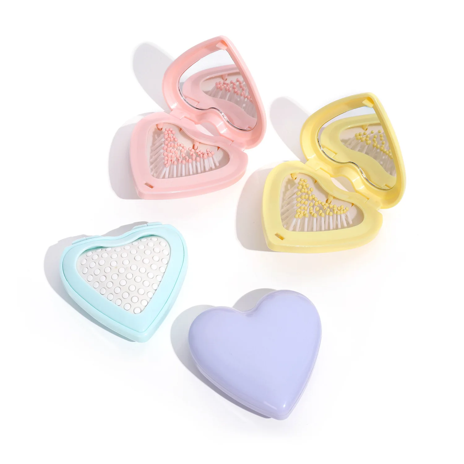 Good Quality Wholesale New Design Travel Pocket Massage Comb Heart-Shaped Mini Foldable Hair Brush Folding Comb with Mirror