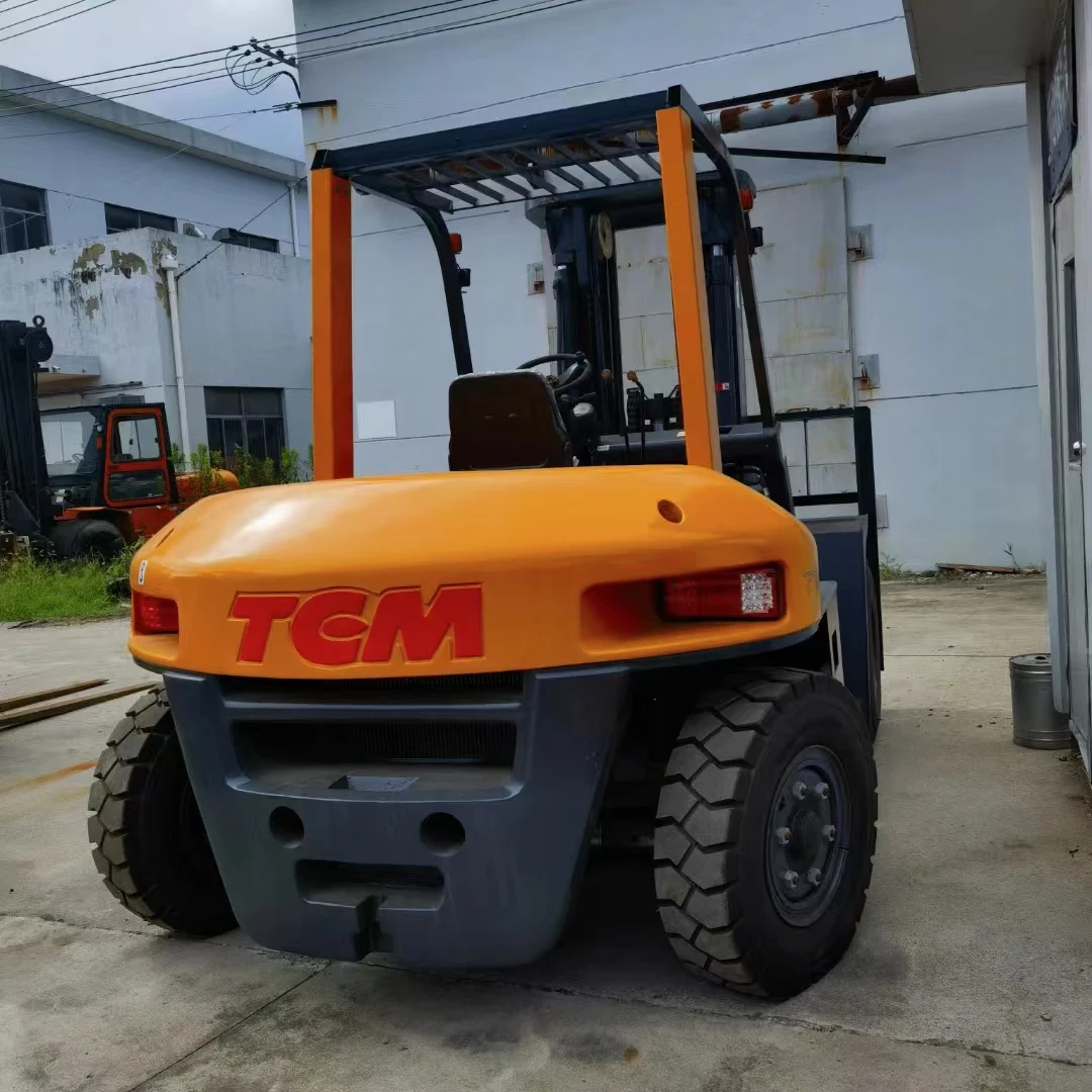 Подержанный TCM 7ton вилочный погрузчик в хорошем состоянии для продажи сделано Японии желтый цвет б/у