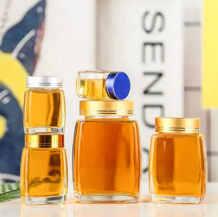 Honey jar with cover can be customized logo honey transparent glass bottle wholesale tomato ketchup manufacturing plant