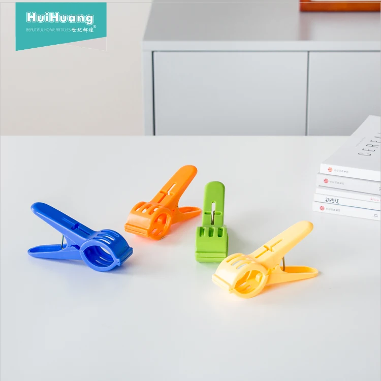 
factory direct sell windproof good quality 4pcs/set plastic beach towel clips wholesale large clothes pegs towel clips 