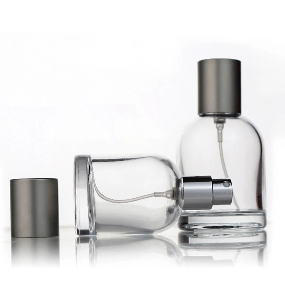 Empty luxury elegance ready stock 30ml custom logo perfume packaging 50 ml 100ml new glass bottle for perfume