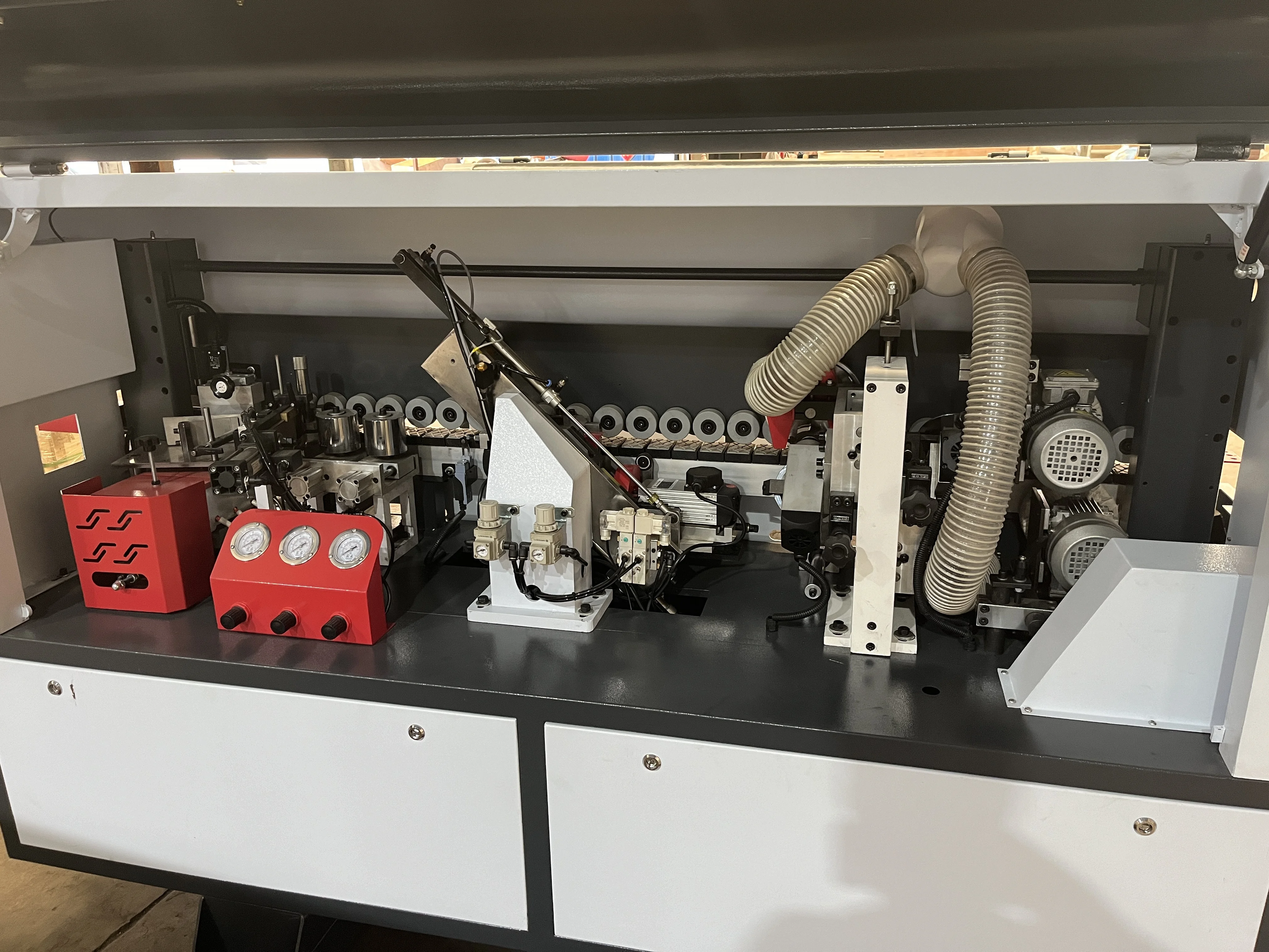 Hot selling fully automatic high-speed medium density fiberboard edge banding machine, four function edge banding manufacturer
