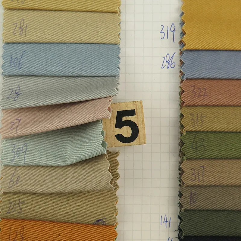 wholesale woven Singeing 32*21 Thicken High density twill Imitation 100% cotton fabric for Pants, jackets, shirts