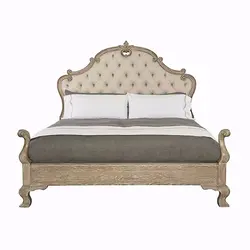 French bedroom with high - end stylish oak double bed