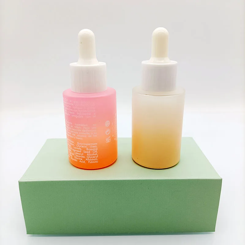 1oz 2oz 30ml 50ml Luxury Round Shape Pink Cosmetic Face Serum Essential Oil Glass Dropper Bottle With Packaging Box