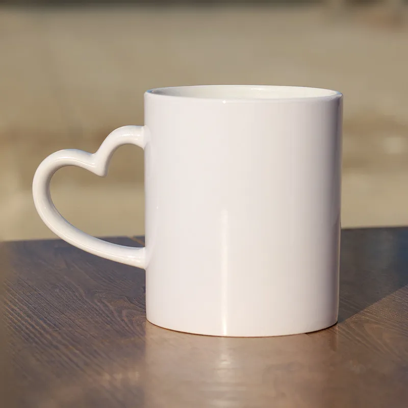 Heart Shaped Handle White Cup/Mugs Ceramic Mugs Coated Cup Thermal Transfer Cups Wholesale with Custom/LOGO Gift