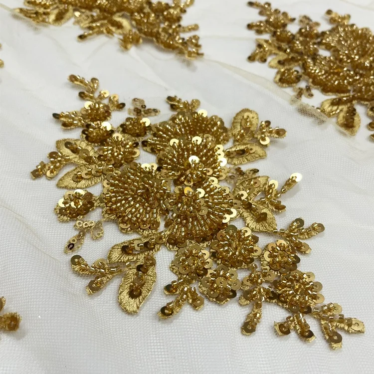 factory wholesale unique  bridal lace fabric beaded luxury heavy beaded border lace fabric for wedding