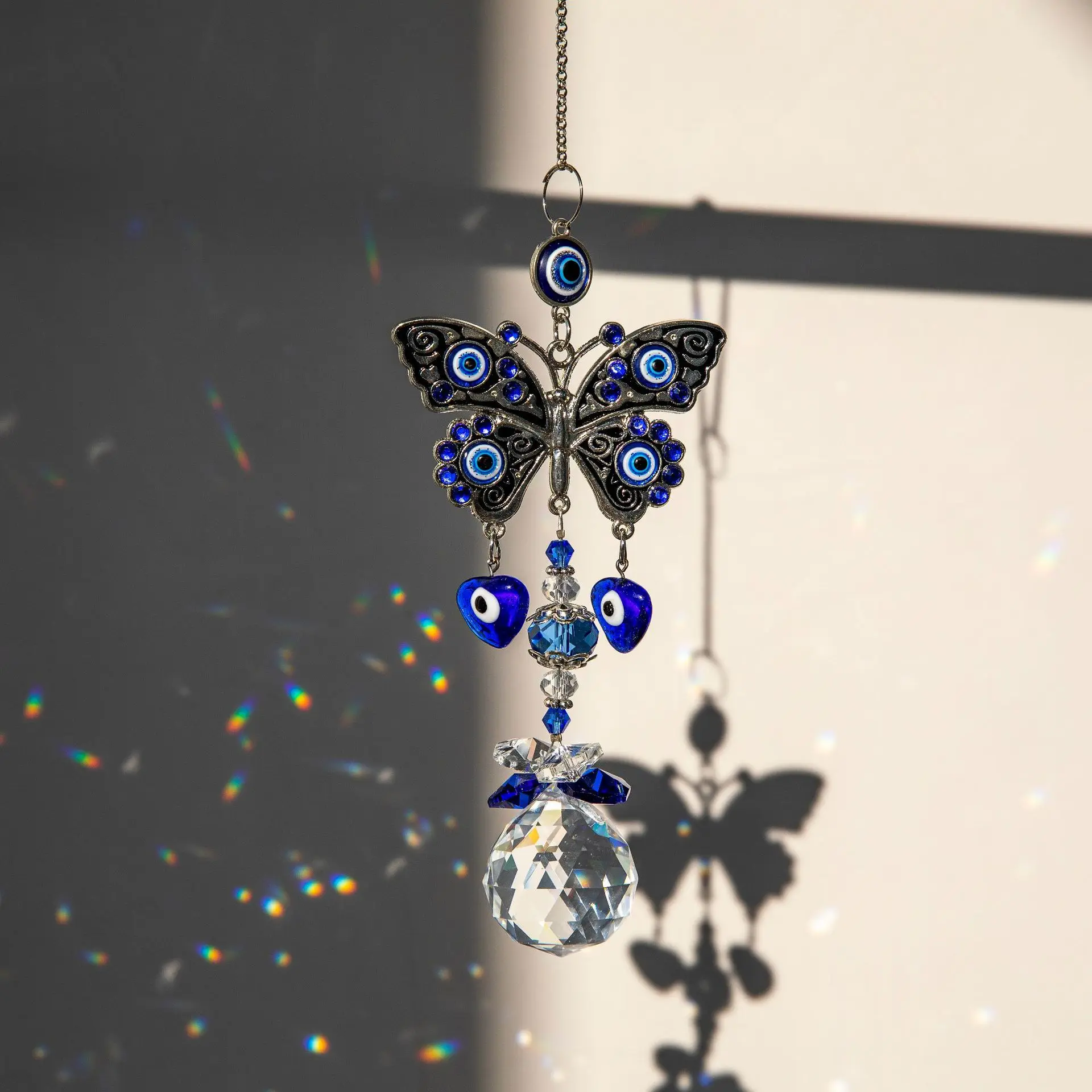 QIAO OEM/ODM Wholesale Crystal Evil Eye Light And Shadow Wind Chime  Hanging Window Gardening  Decor Sun Catcher
