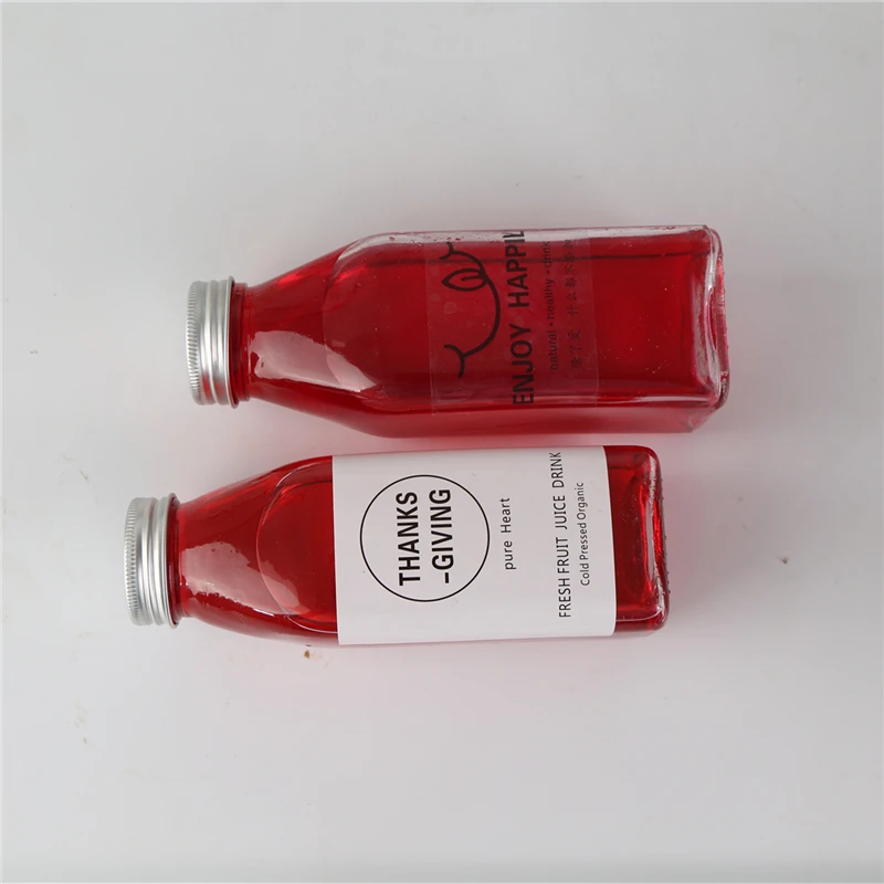 
Disposable PET Plastic Juice Beverage Bottle Square Portable To Go With Transparent Tape Cover To Seal Empty Beverage Bottles 