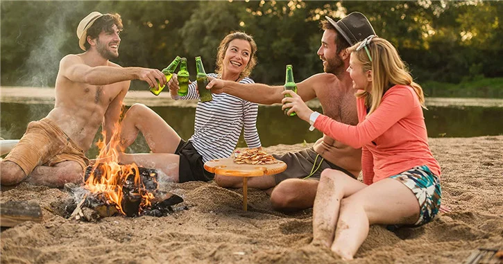 Round bamboo picnic table with knives & wine glass holders