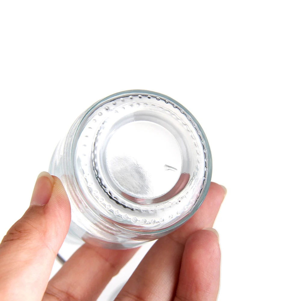 Wholesale popular UK 50ml Swing Top Drinking Water Empty Transparent Beverage Juice Coffee Milk Tea Glass Bottle In Stock