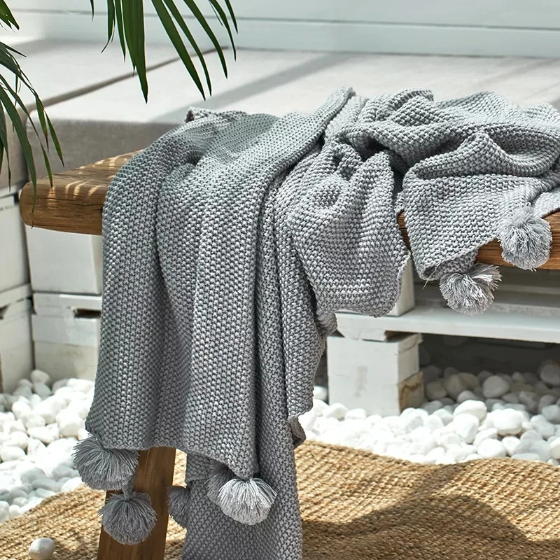 Wholesale Acrylic Solid Knitted Blanket High Quality Custom Super Soft Bed Blanket With Pom Pom