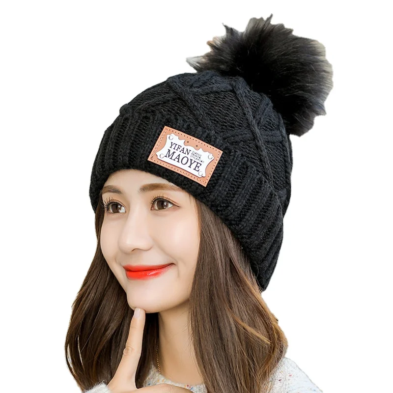 
 adult ladies soft and warm knit beanie hat top with matching colour fake fur pompom for winter season  