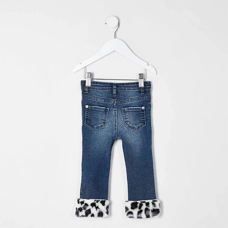 
Factory wholesale mini girls blue distressted faux fur hem denim jeans 