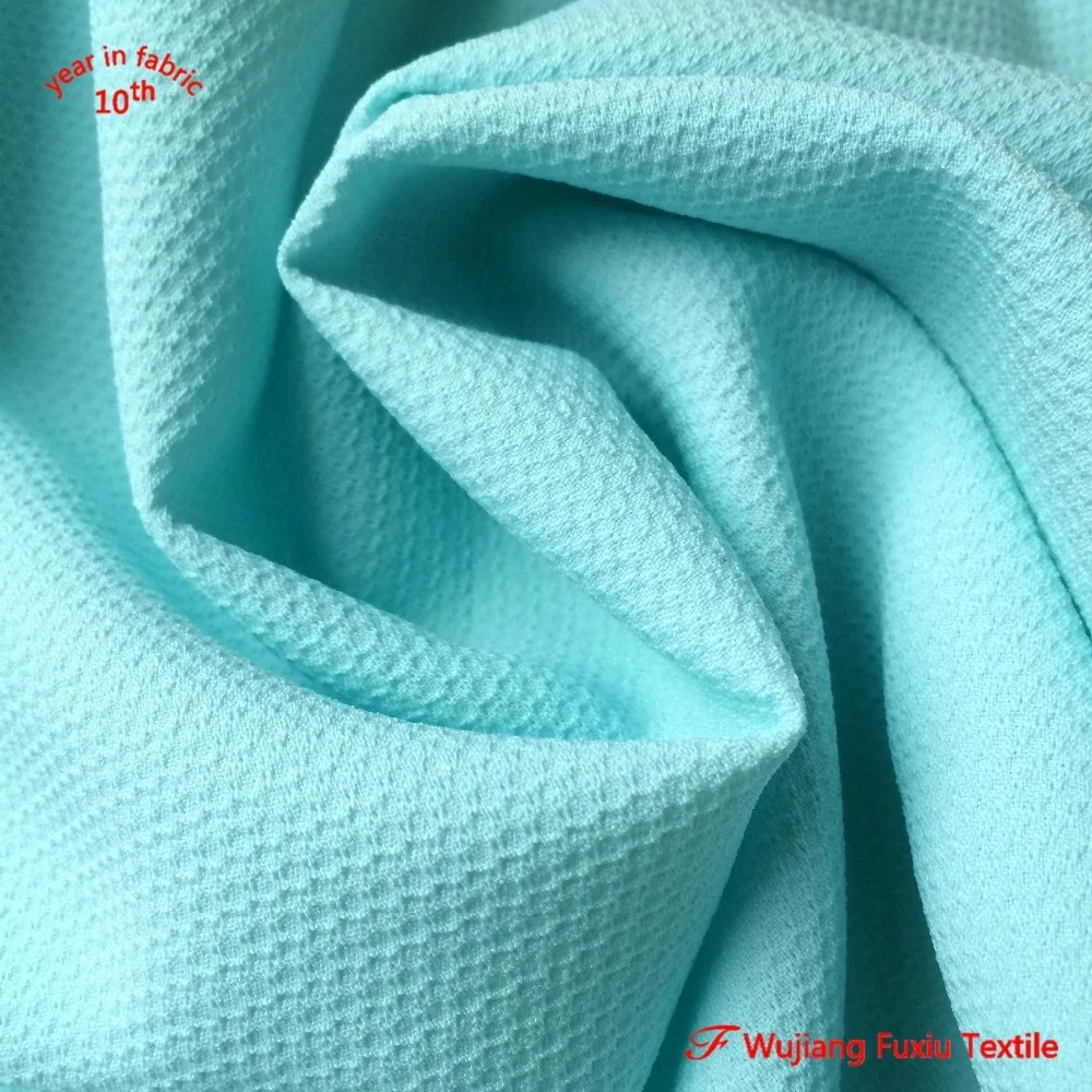 stretch yarn 100 polyester jacquard honeycomb fabric for lady wear