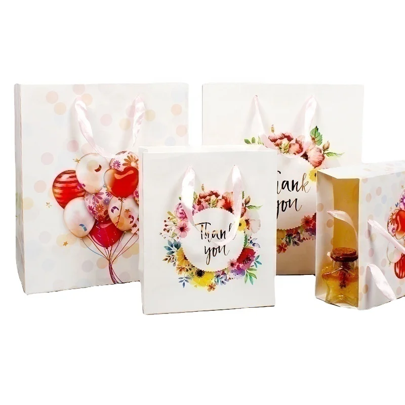 New boutique handbag bronzing craft gift bag  high-grade fancy white paper card fancy paper gift bag