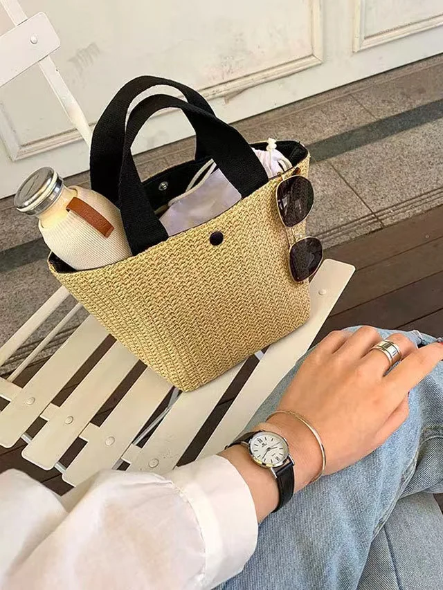 New arrival ladies bucket handbag beach ladies turf handbag Holiday straw ladies fashion bag Ins online celebrity weaving Bag