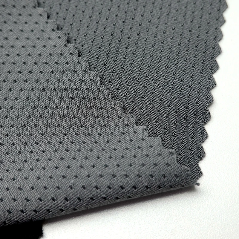 Quick dry 97/3 polyester spandex solid knit custom eyelet mesh jersey sports wear fabric for tshirts
