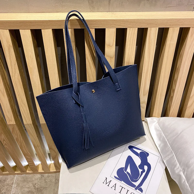 2021 New Arrival Fashion Trend One Shoulder Handbag Pure Color Tassel Clutch Tote Bag For Women