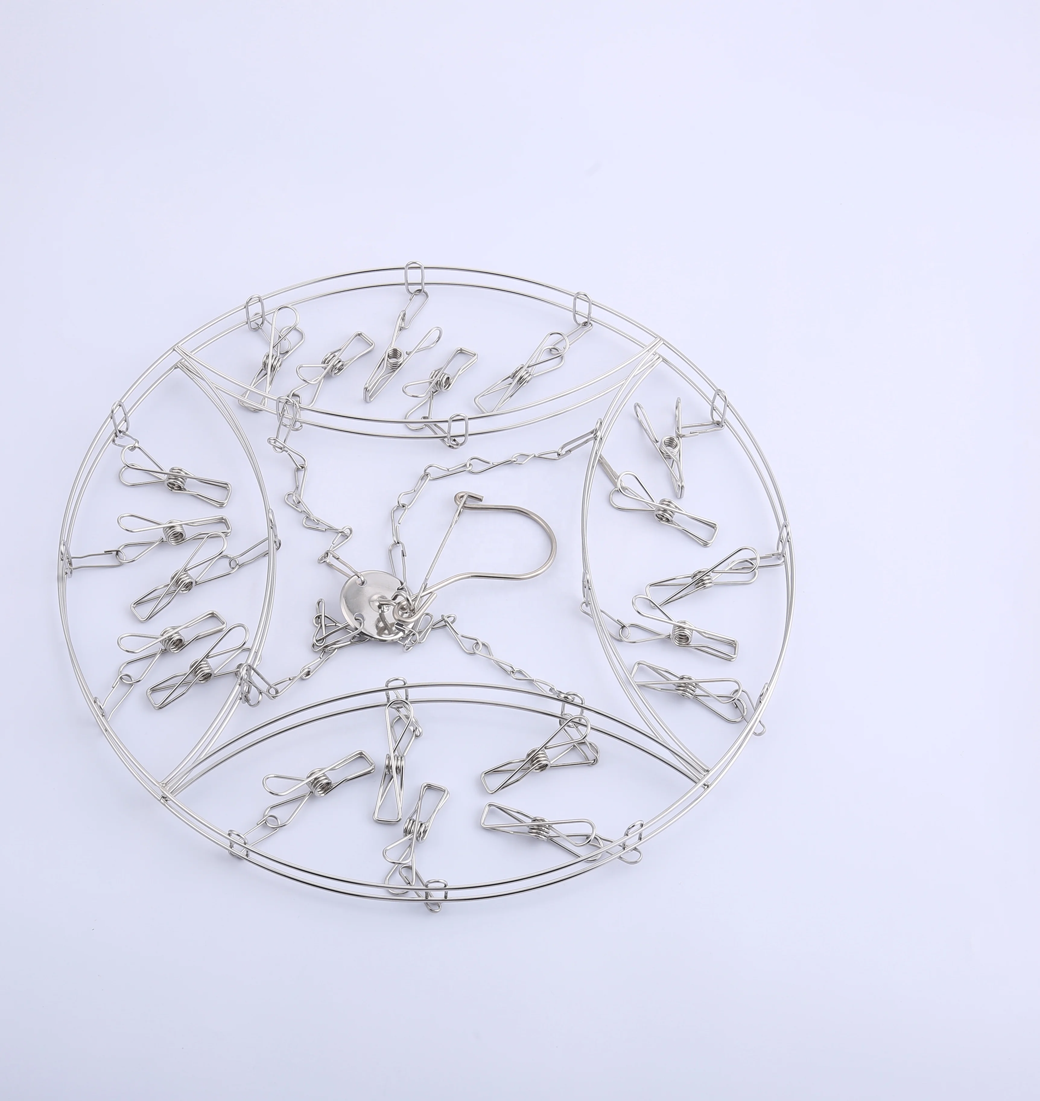 Китайская фабрика производит серебряные вешалки из нержавеющей стали с прищепками и вешалками для носков