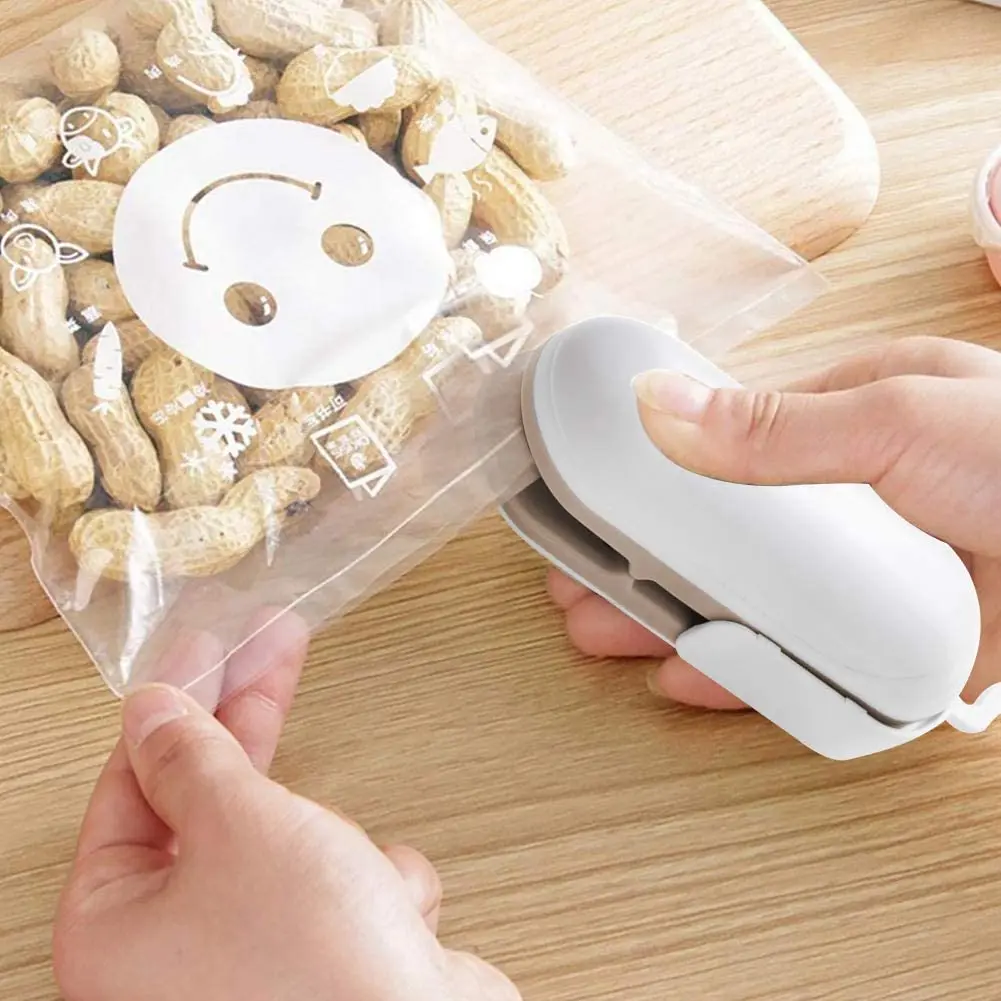 Handheld Food Plastic Bag Package Vacuum Sealing Machine Mini Sealer Portable Travelling Hand Press Heat Sealing Machine
