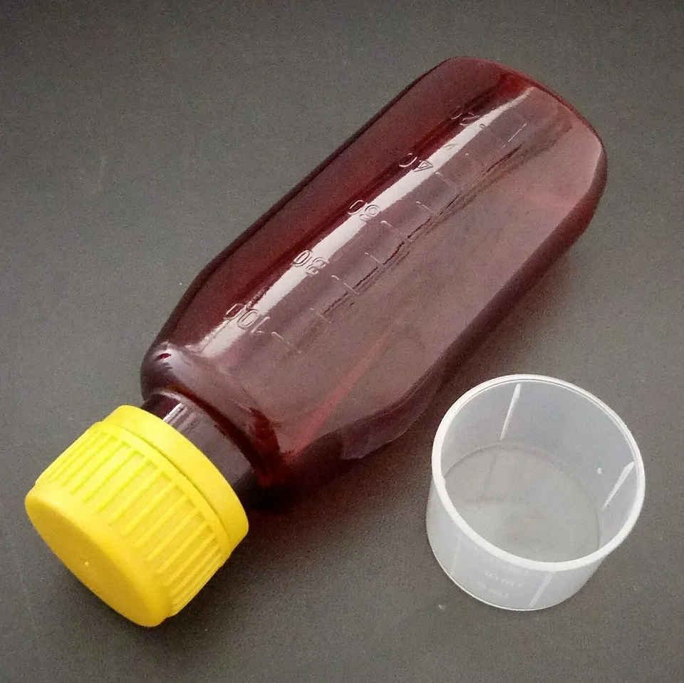 100ml oral liquid syrup amber PET plastic bottle with measuring cup