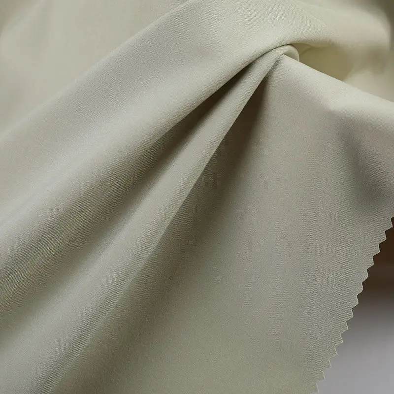 Shaoxing yuyuan imp 100 polyester non spandex chemical fabrics roll woven cloth garment machienical stretch nslycra fabric
