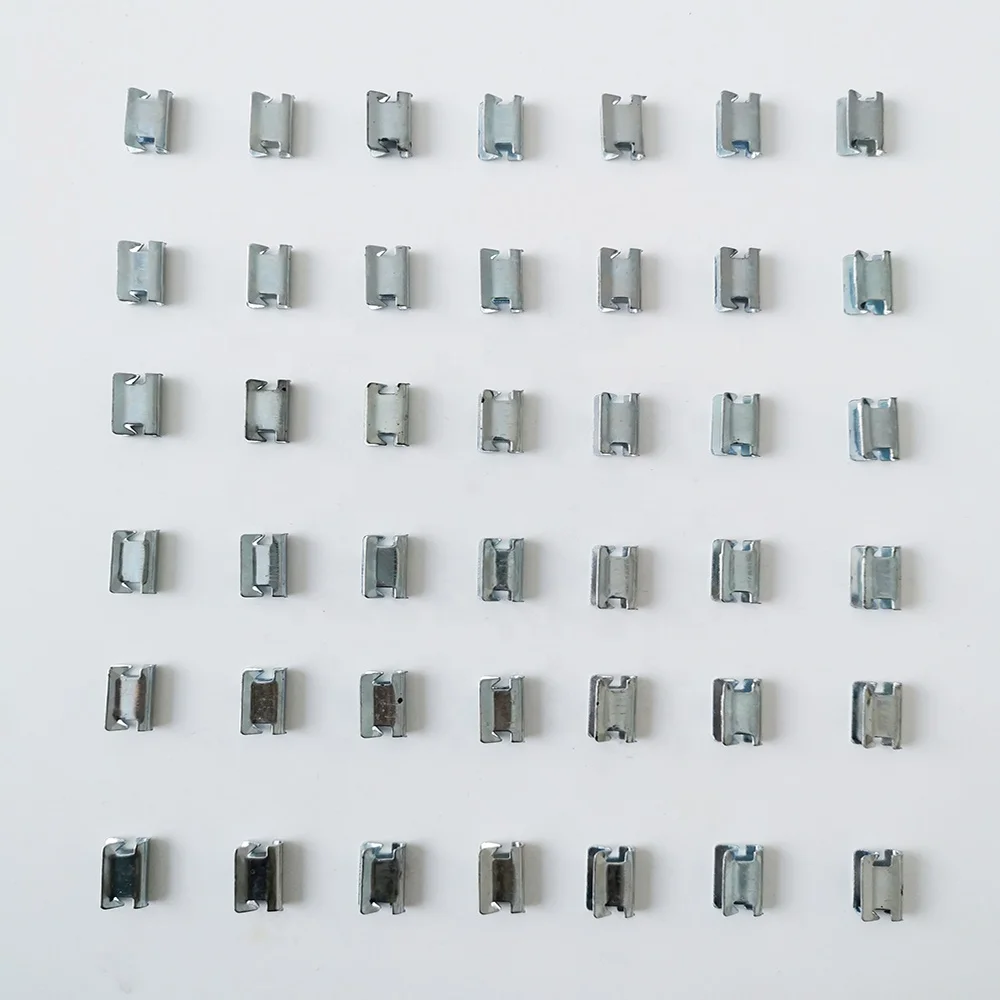 metal clips that secures a piece of armor and an bellows cover