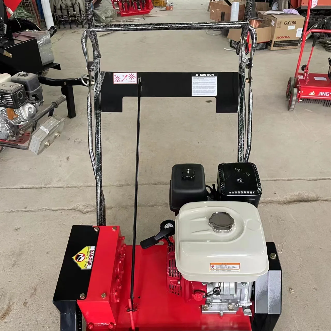 Turf comb machine with manual push to remove dea d grass