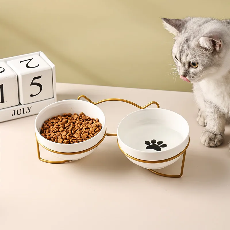 Manufacturer New Design Pet Bowl Protect The Spine Cute Cat Footprint Ceramic Cat Food Double Bowl