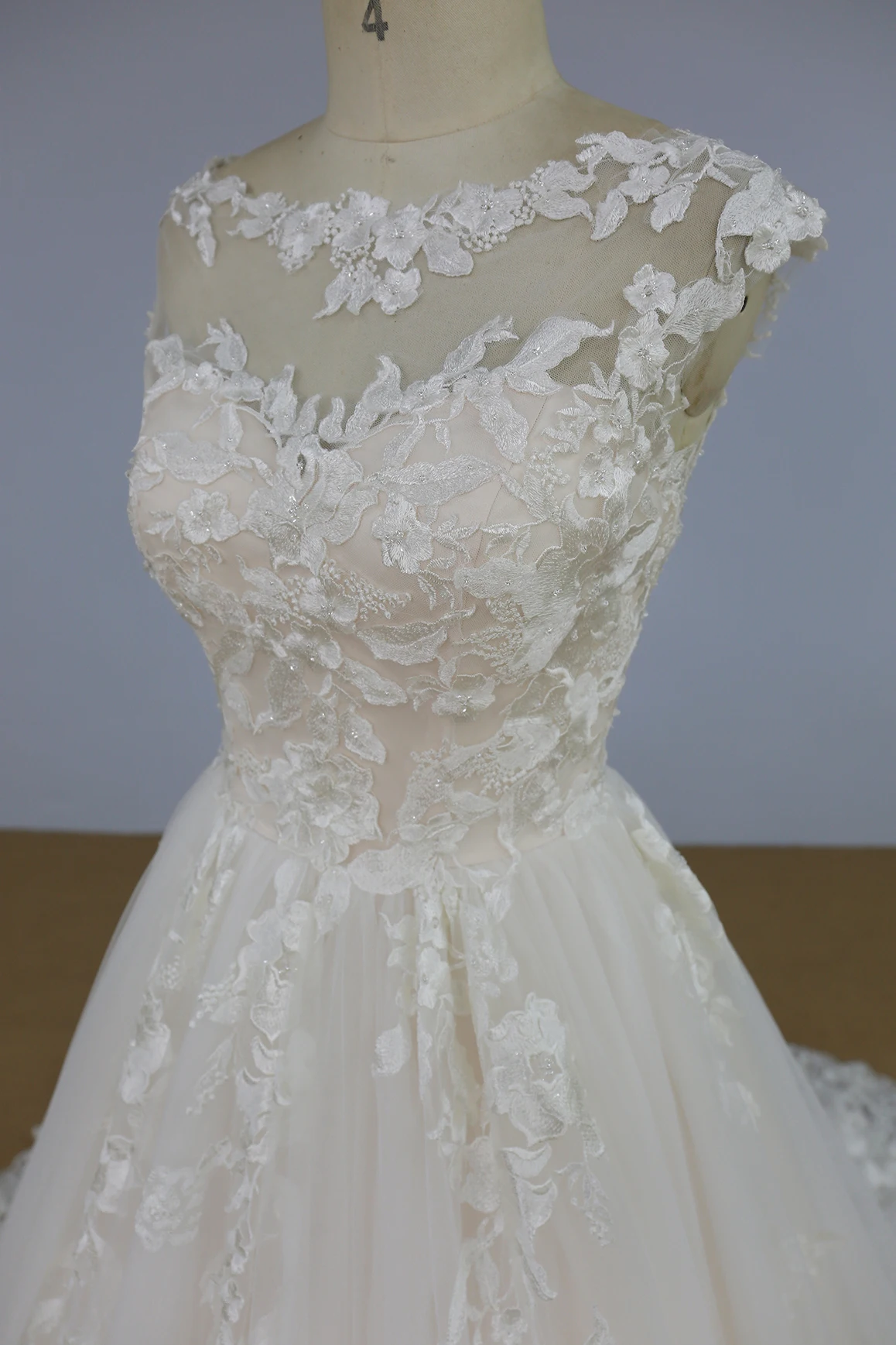 Soft pink bridal dress cap sleeves beaded lace wedding