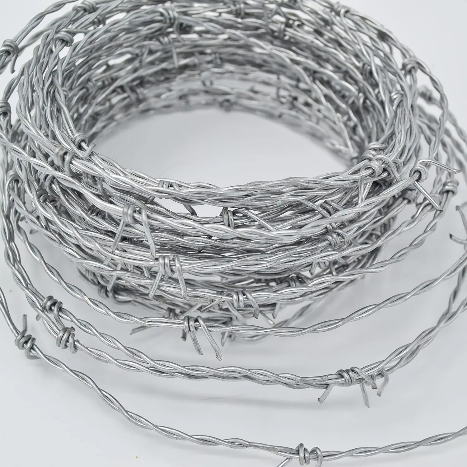 Galvanized Steel Double Twist Strands Barbed Steel Wire Security Single Strand Barbed Wire PVC Coating High Quality Barbed Wire