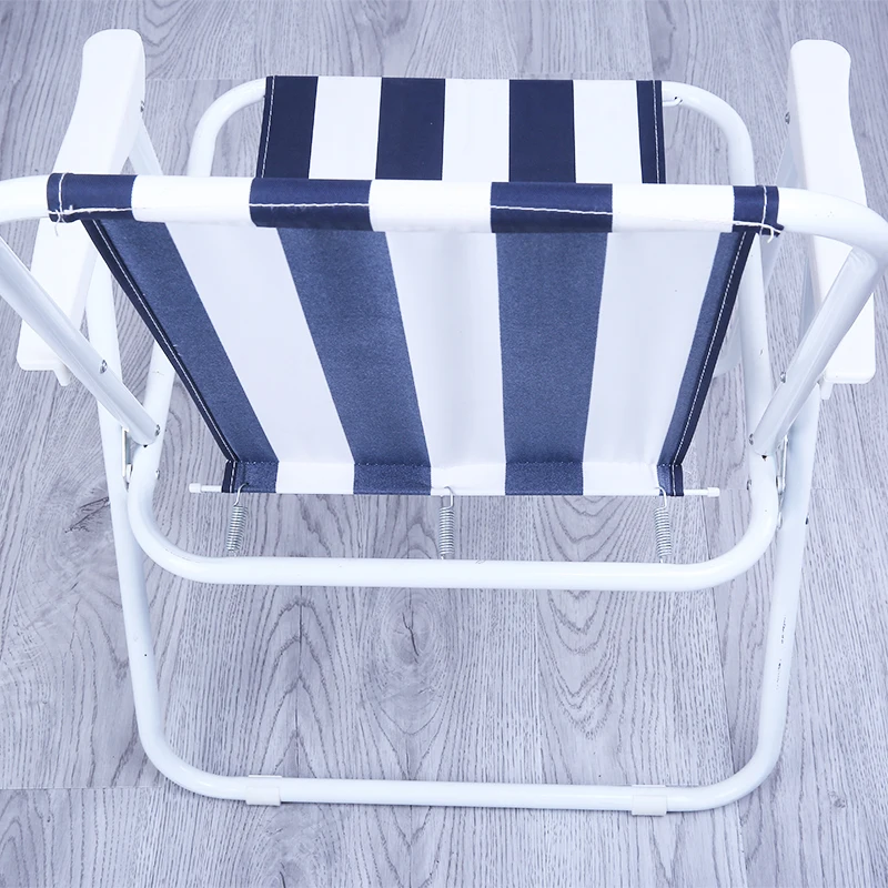 Steel foldable camping chair with white plastic armrest