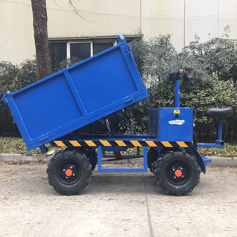 Hydraulic electric four-wheeler workers load and unload engineering vehicles