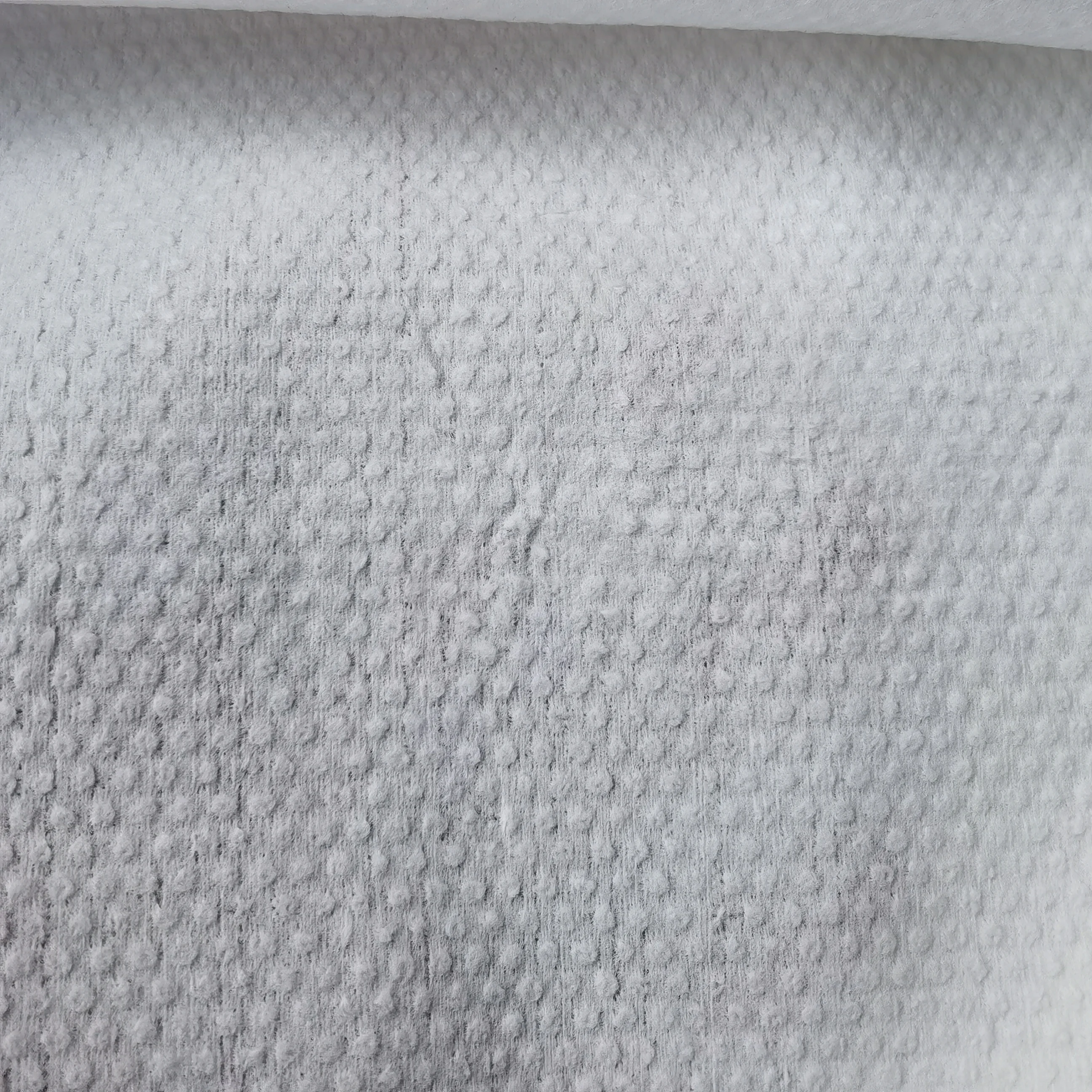 Spunlace Non Woven PP Polyethylene Viscose PET Parallel Cross Emboss Spunlace Nonwoven  Fabric Factory  for Personal Care