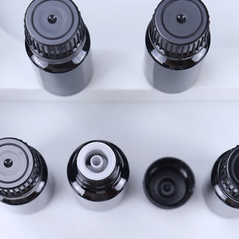 Cosmetic Packaging Matte Black Cosmetic 10ML Essential Oil Bottle With Plastic Screw Cap