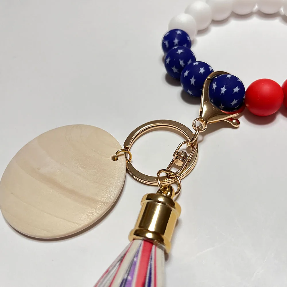 2022 New Design Custom Silicone Beads Bracelet Keychain Elastic Wristlet With Monogram Disc Silicone Wristlet Keychain Bracelet