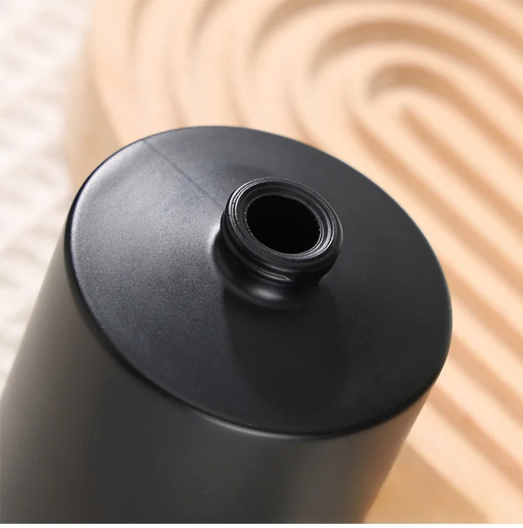 Wholesale Matte Black Glass Perfume Bottle 50ml Round Perfume Glass Bottle With Black Cap