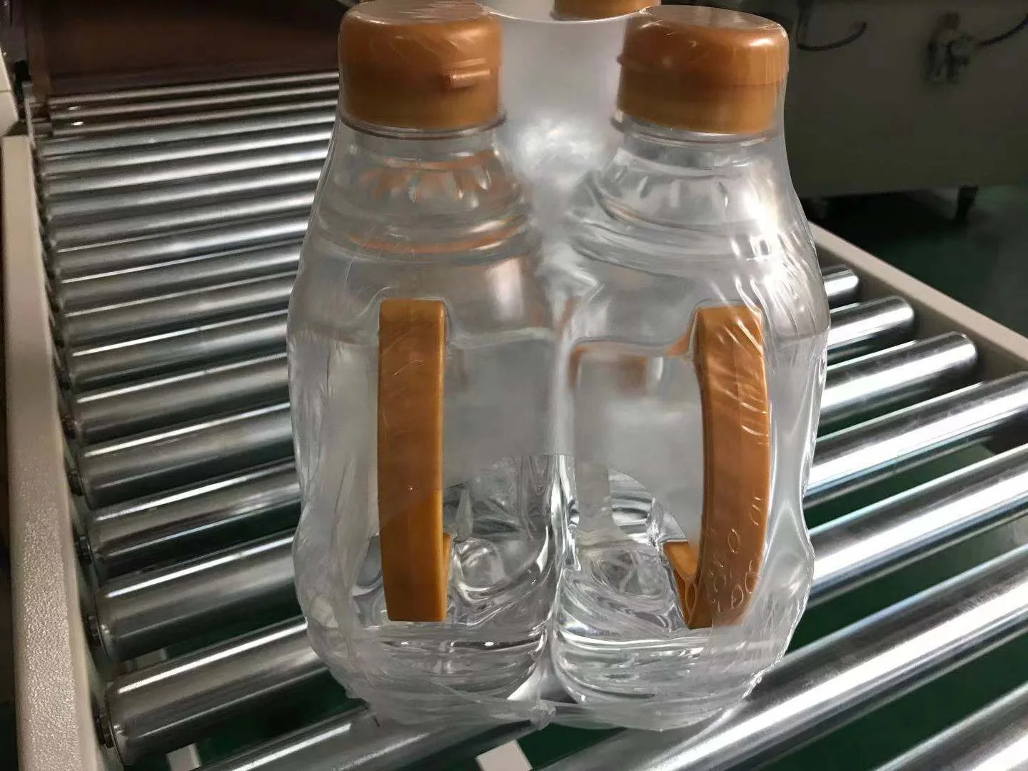 A dozen coke automatic sealer sleeve shrink wrapping machine price sealing machine